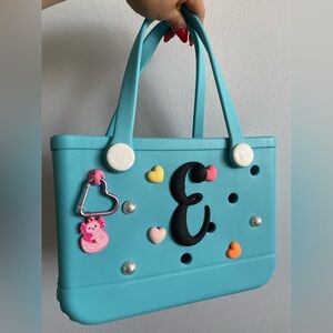 Aqua Blue Handbag with bag charms